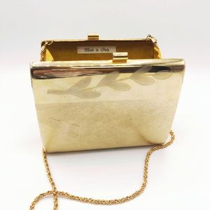 Gold toned vintage metal structured purse etched leaf design